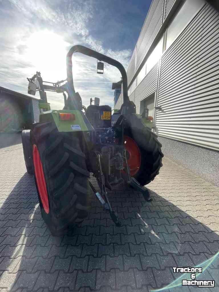 Tractor Claas Axos 340 tractor met Stoll voorlader