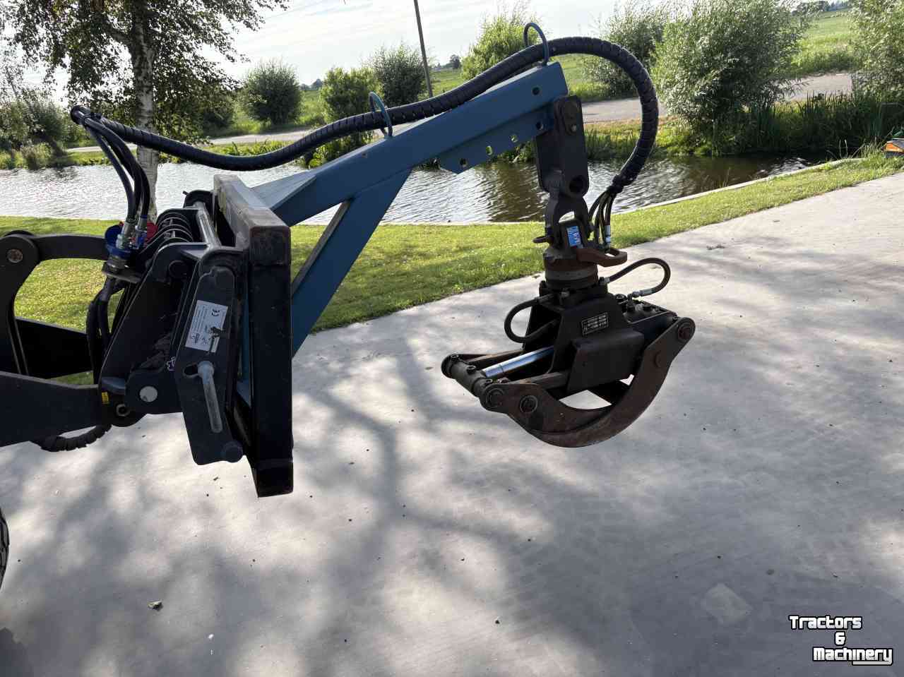 Wood Grappels  Bakker houtgrijper bomentang CW10 en Euro snelwissel