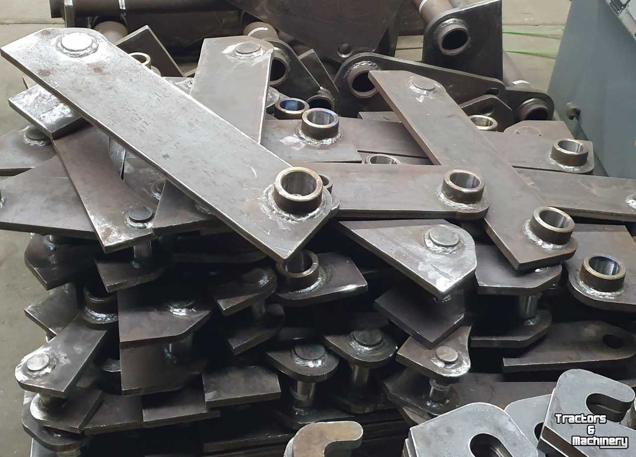 Quick hitches  snelwissel aanlas oren voor de shovel en verreiker