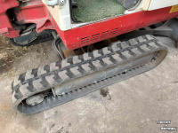 Excavator tracks Takeuchi TB016 met machinetrailer