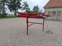 Conveyor  Kistenvulband